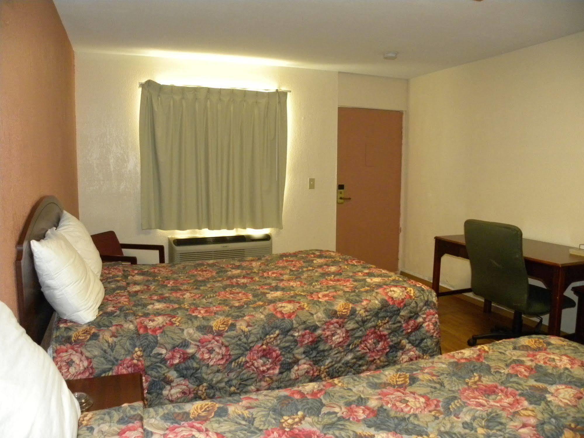 Guest Inn روجرز المظهر الخارجي الصورة